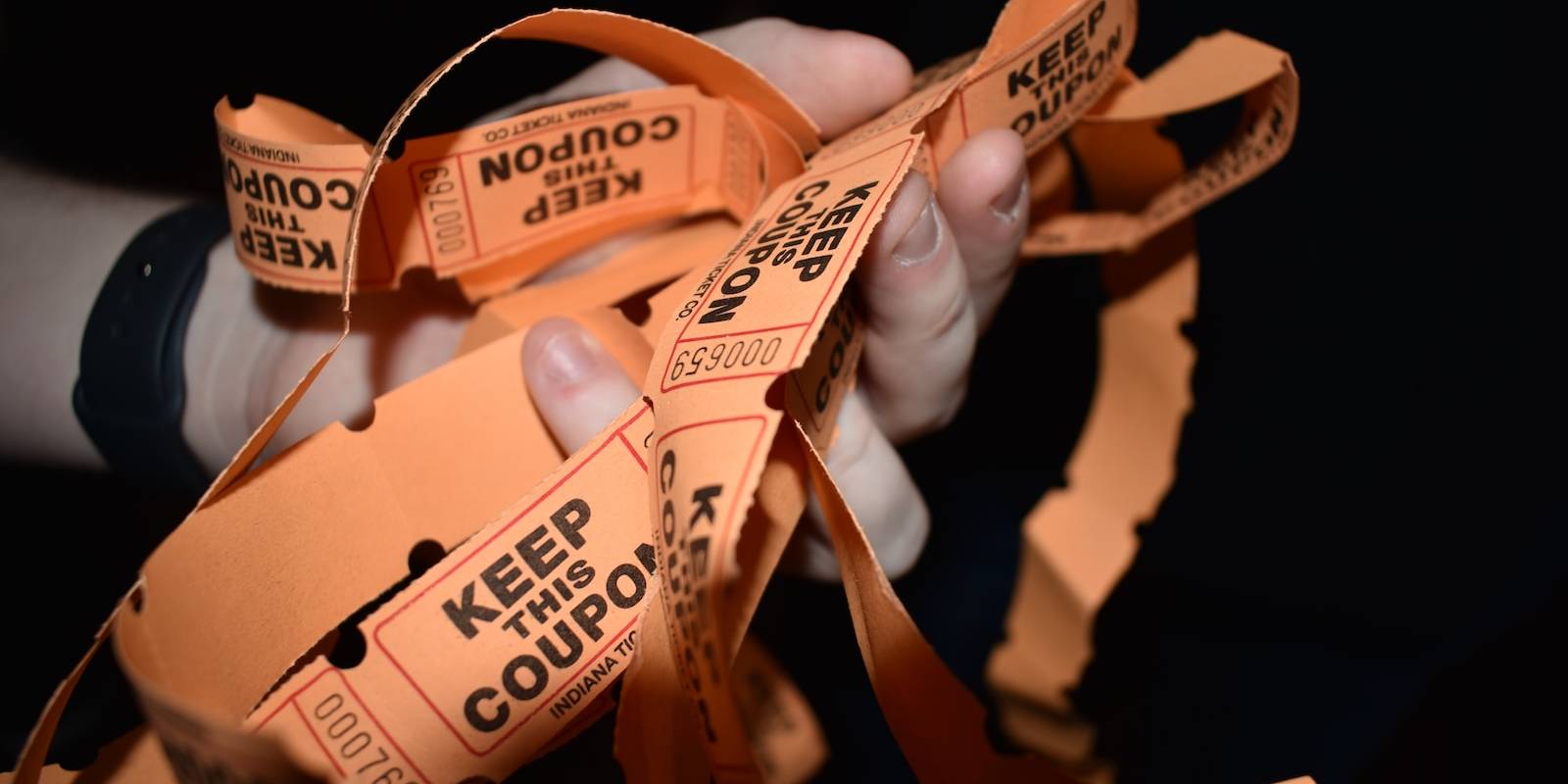 a group of brown bags with brown labels